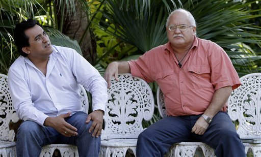 Salvadorans Ernesto Cruz Leon, left, and Otto Rene Rodriguez wait to be interviewed by The Associated Press in Havana, Cuba, Tuesday Feb. 8, 2011. Both are serving time in a Cuban prison for their involvement in a 1990's bombing campaign against Cuba’s tourism industry. - AP Photo  Read more: http://www.bnd.com/2011/02/09/1583840/bomber-names-ex-cia-operative.html#ixzz1DUPB4EHH