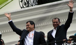 Ecuadorean President Rafael Correa (L) celebrates his re-election wit