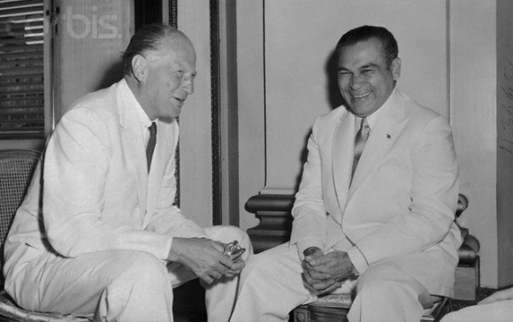 July 1957, Havana, Cuba --- Cuban President Fulgencio Batista, (R), enjoys a chat with the new United States Ambassador to Cuba, Earl E. T. Smith, after the latter presented his credentials here on July 23rd. --- Image by © Bettmann/CORBIS