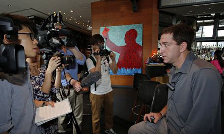 Greenwald talking to reporters on 10 June 2013, the day after Snowden revealed his identity in the Guardian. Photograph: AP