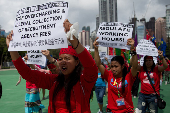 Marcha por la mejora de los salarios y los derechos de los trabajadores en Hong Kong, China.