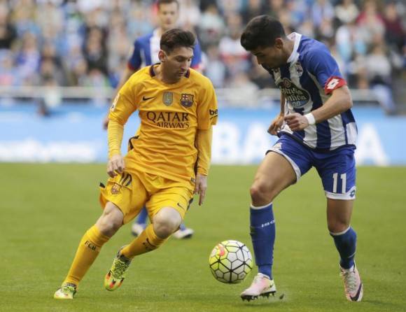 Messi y Juanfran Moreno Foto: Reuters