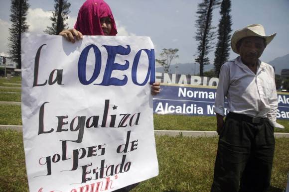 Protestas contra la OEA. Foto: Arnulfo Franco/ AP