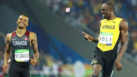 Usain Bolt y Andre de Grasse discutirán el oro en la final de mañana. Foto: Reuters.