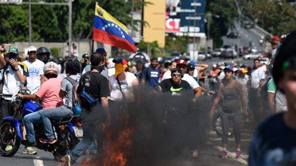 Los actos de violencia los protagonizó la oposición. Foto: Juan Baretto/ AFP.